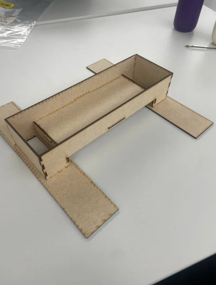 The assembled laser-cut MDF bridge, showing the interlocking panels and lateral supports.